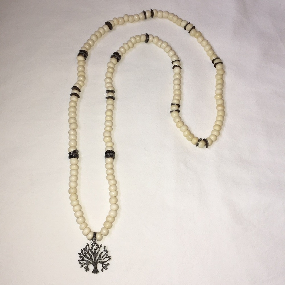 ARHAUS Jewels Pave diamond charm bone bead necklace.